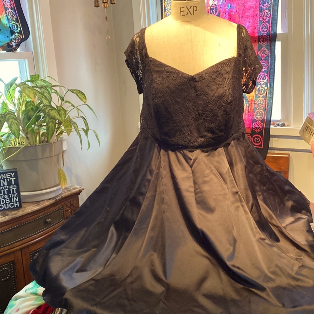 Torid black dress Three layers under skirt.